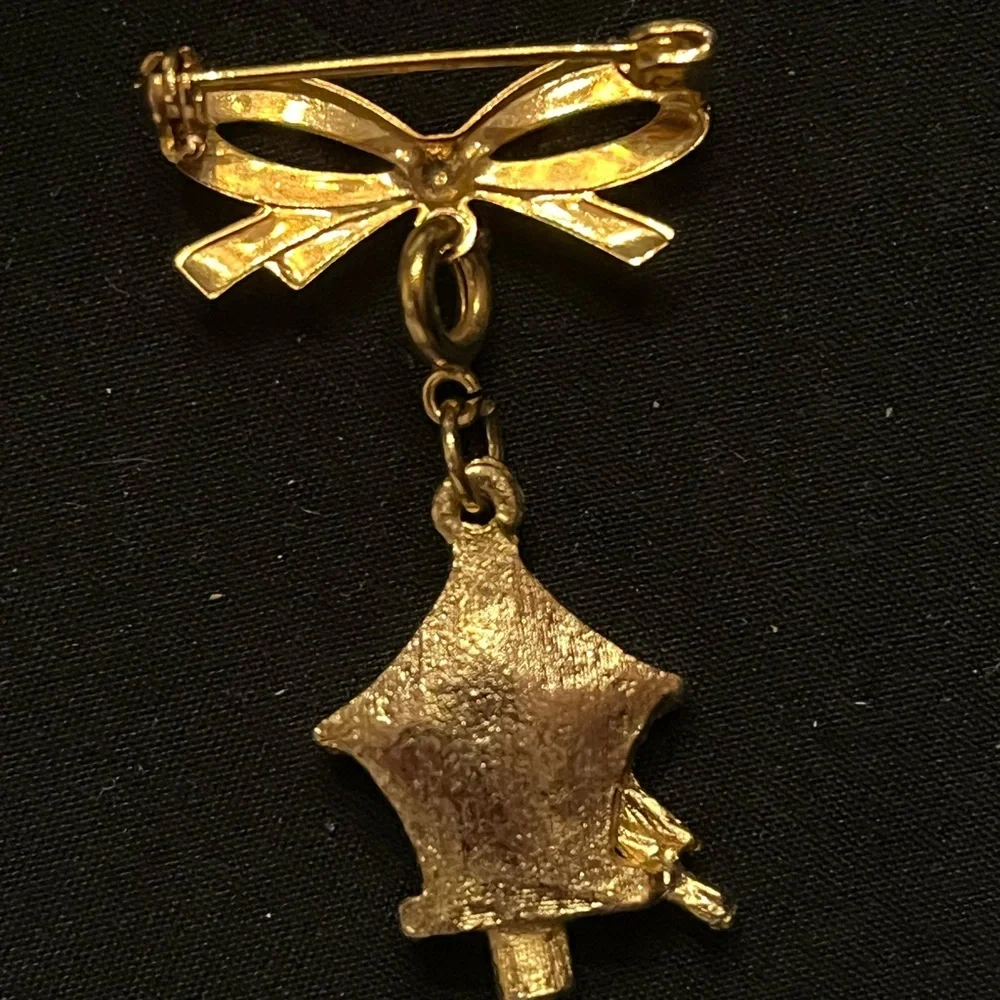 Vintage Gold Tone Bow and Birdhouse Brooch with Red Rhinestone Pendant